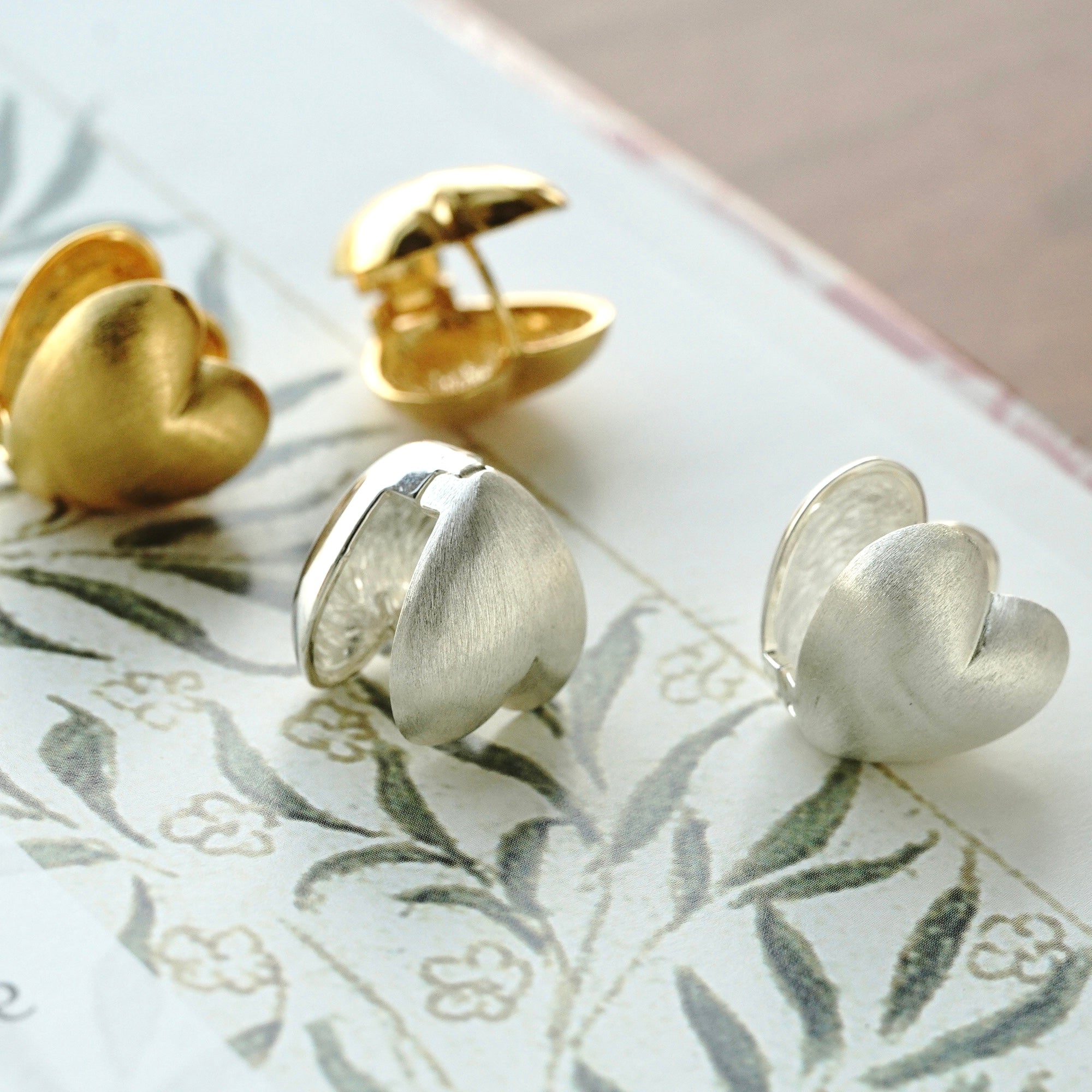 gold double side heart earrings